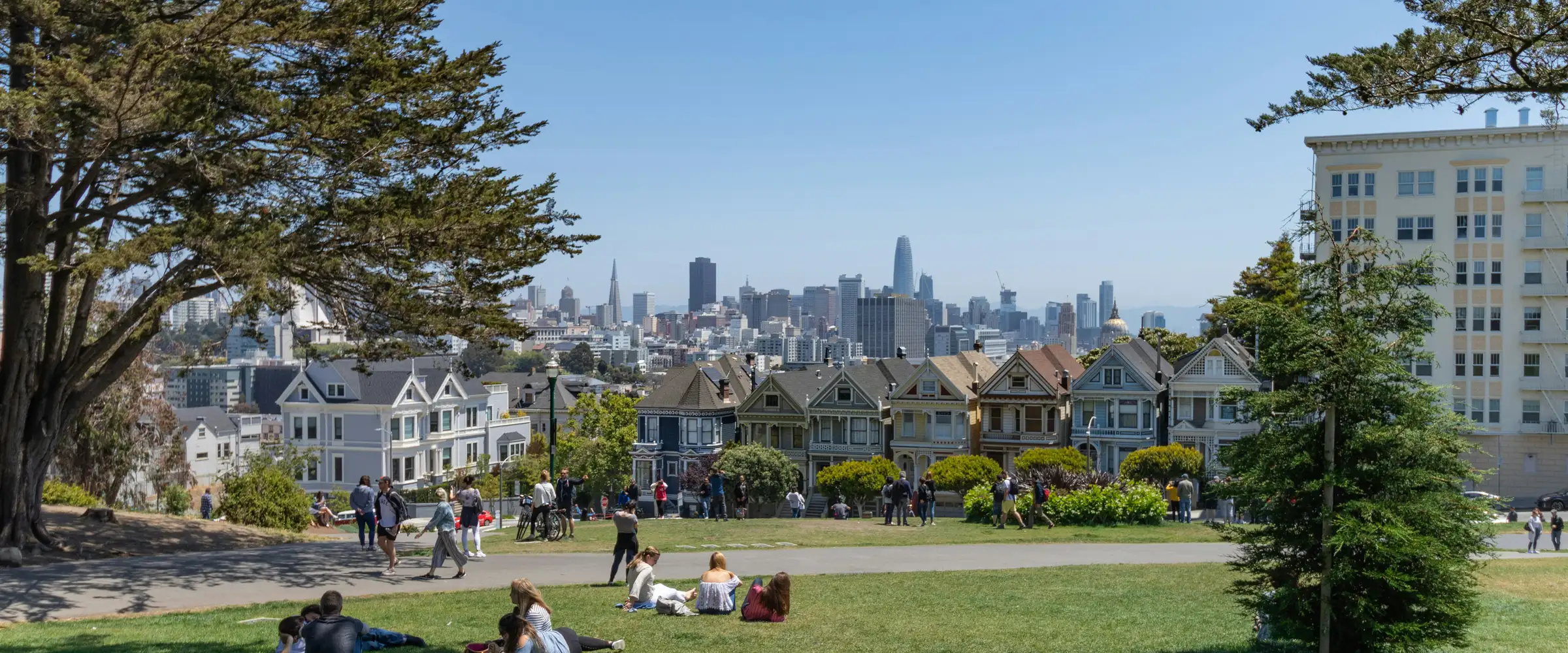 The Painted Ladies and downtown skyline from Alamo Square in San Francisco