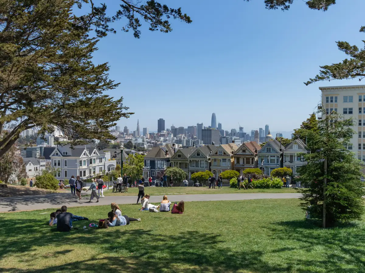 The Painted Ladies and downtown skyline from Alamo Square in San Francisco